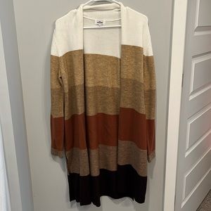 Super soft cardigan! Never worn.